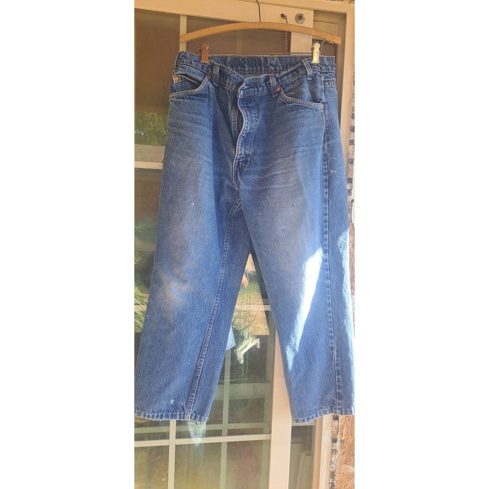Vintage early 90's Levi’s 557 Men’s Jeans 35x30 Made in USA Relaxed Fit Orange T